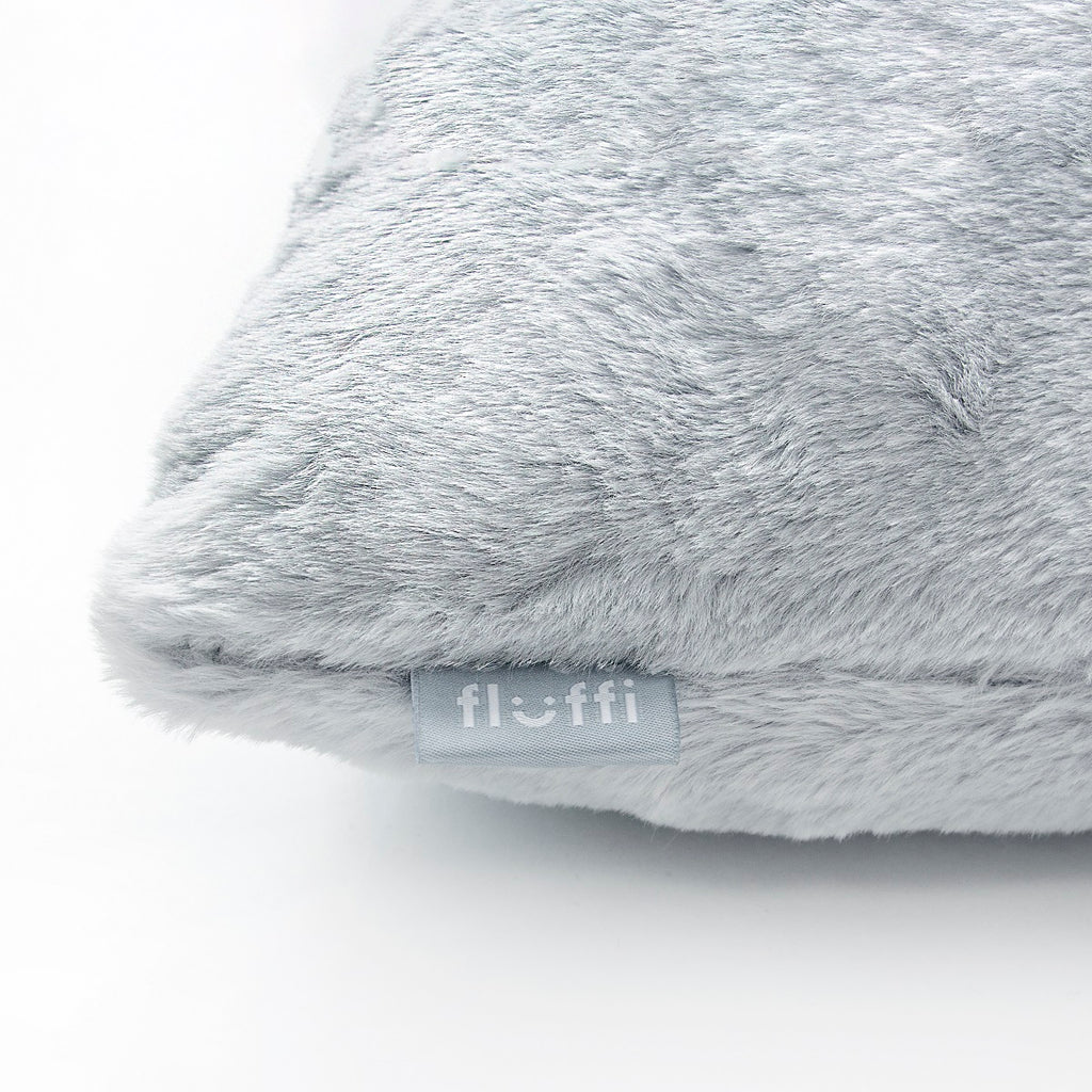 Grey fluffy cushion faux fur