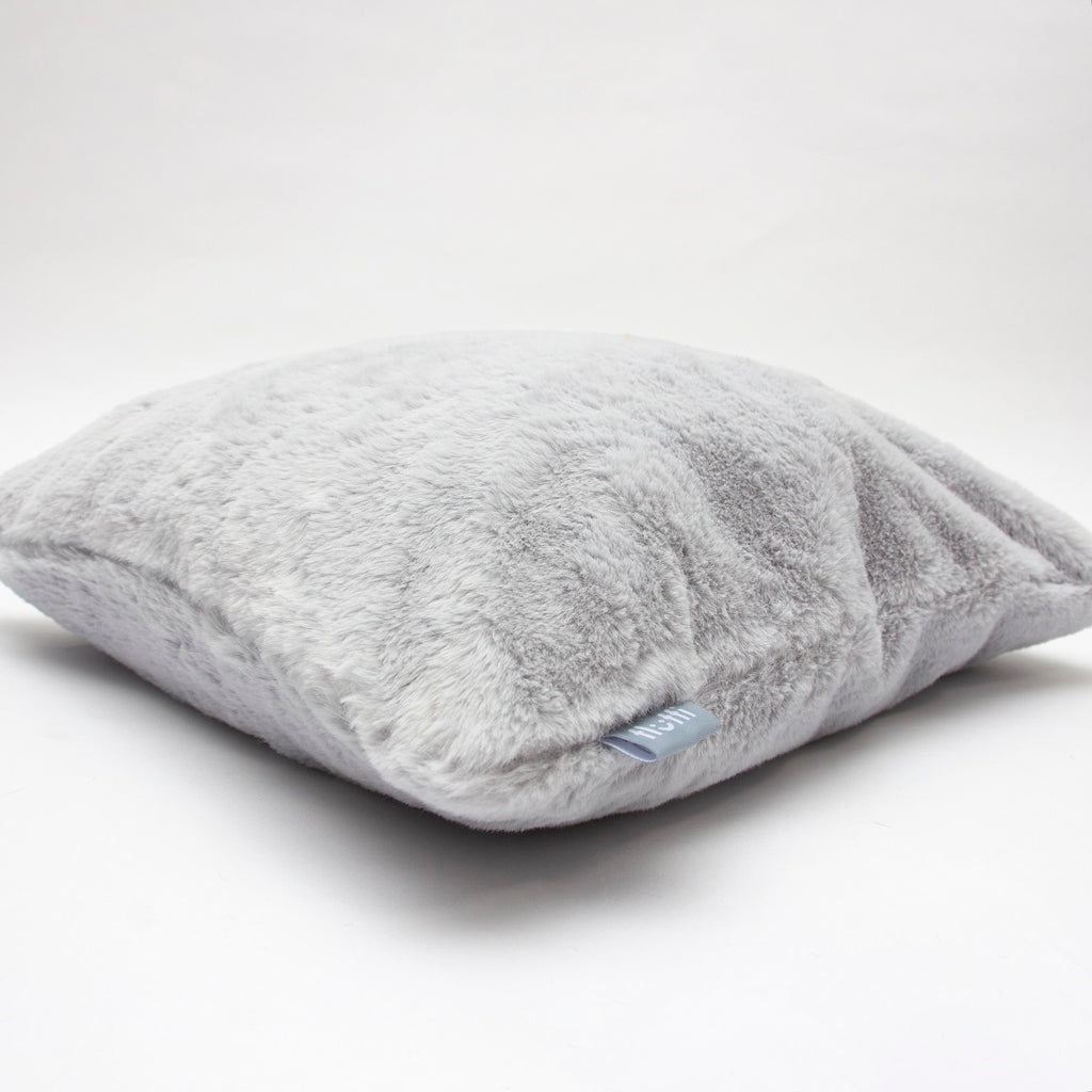 Grey fluffy cushion faux fur
